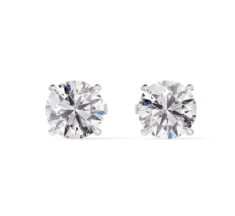 trendy ear studs-Classic Four Prong Diamond Stud Earrings