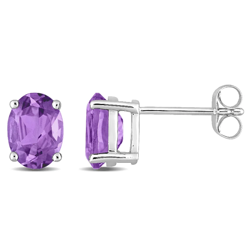 zirconia stud earrings-Miadora Oval-cut Amethyst Solitaire Stud Earrings in 14k White Gold