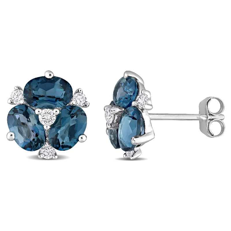 simple stud earrings for women-Miadora Oval-cut London-Blue Topaz and 1/5ct TDW Diamond Floral Stud Earrings in 14k White Gold